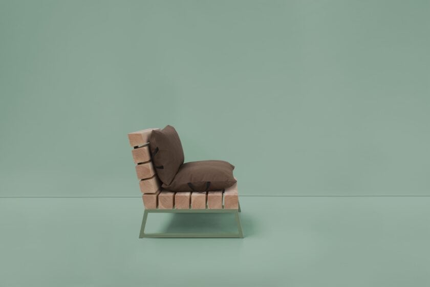 Stoere loungestoel van hout en staal voor op het terras
